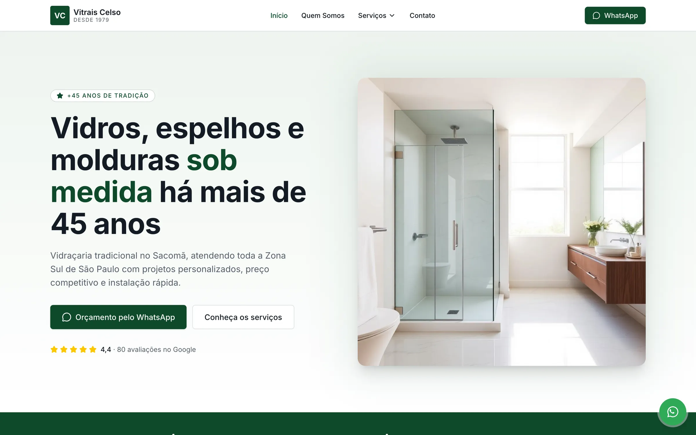 Topo do site da Vitrais Celso em computador: “Vidros, espelhos e molduras sob medida há mais de 45 anos” ao lado da foto de um box de vidro